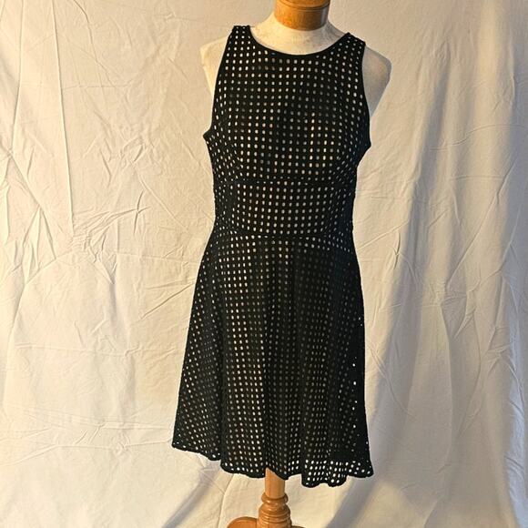 Sleek Black Mesh Overlay Dress with Geometric Cutouts-Size 10 - Picture 1 of 5